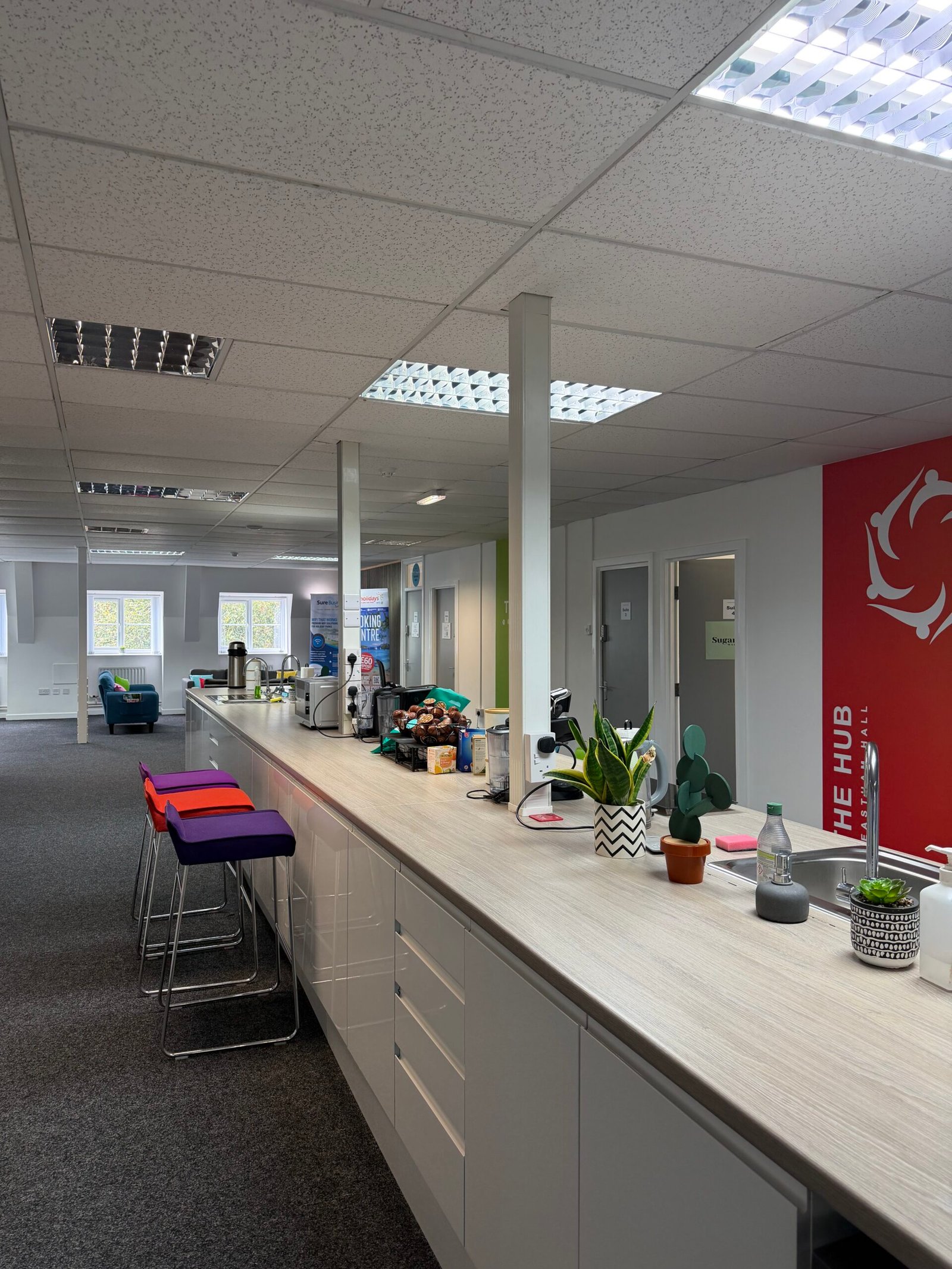 Shared coworking kitchen and breakout space inside Eastham Hall, Wirral