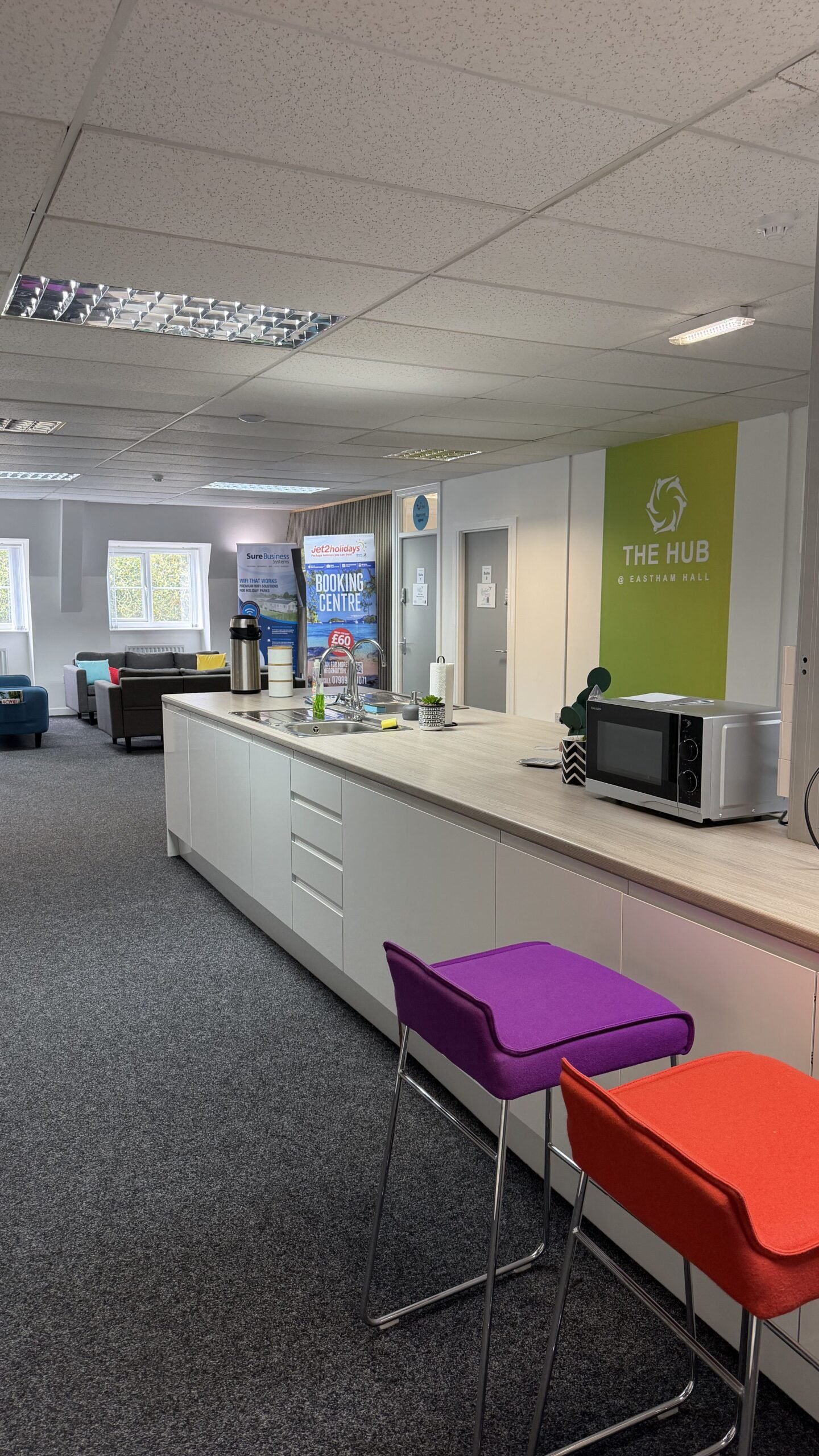 Shared coworking kitchen and breakout space inside Eastham Hall, Wirral